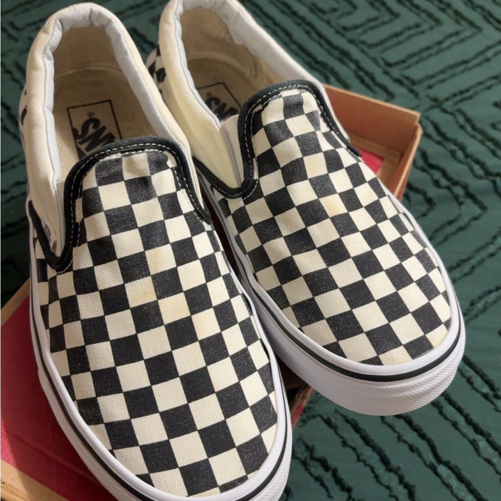 Vans Black and White Checkerboard Slip-On Sneakers